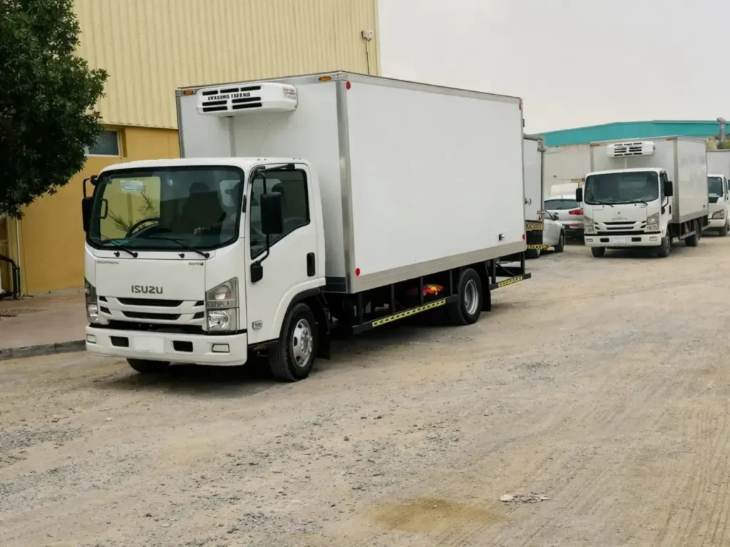 Modern white freezer truck in Dubai 2026 loaded for frozen food and cold cargo delivery across the UAE