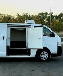 Refrigerated chiller van transporting hospital and medical supplies in Abu Dhabi for safe temperature-controlled delivery